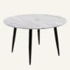 Minimalist round coffee table with marble effect top and black tapered legs.