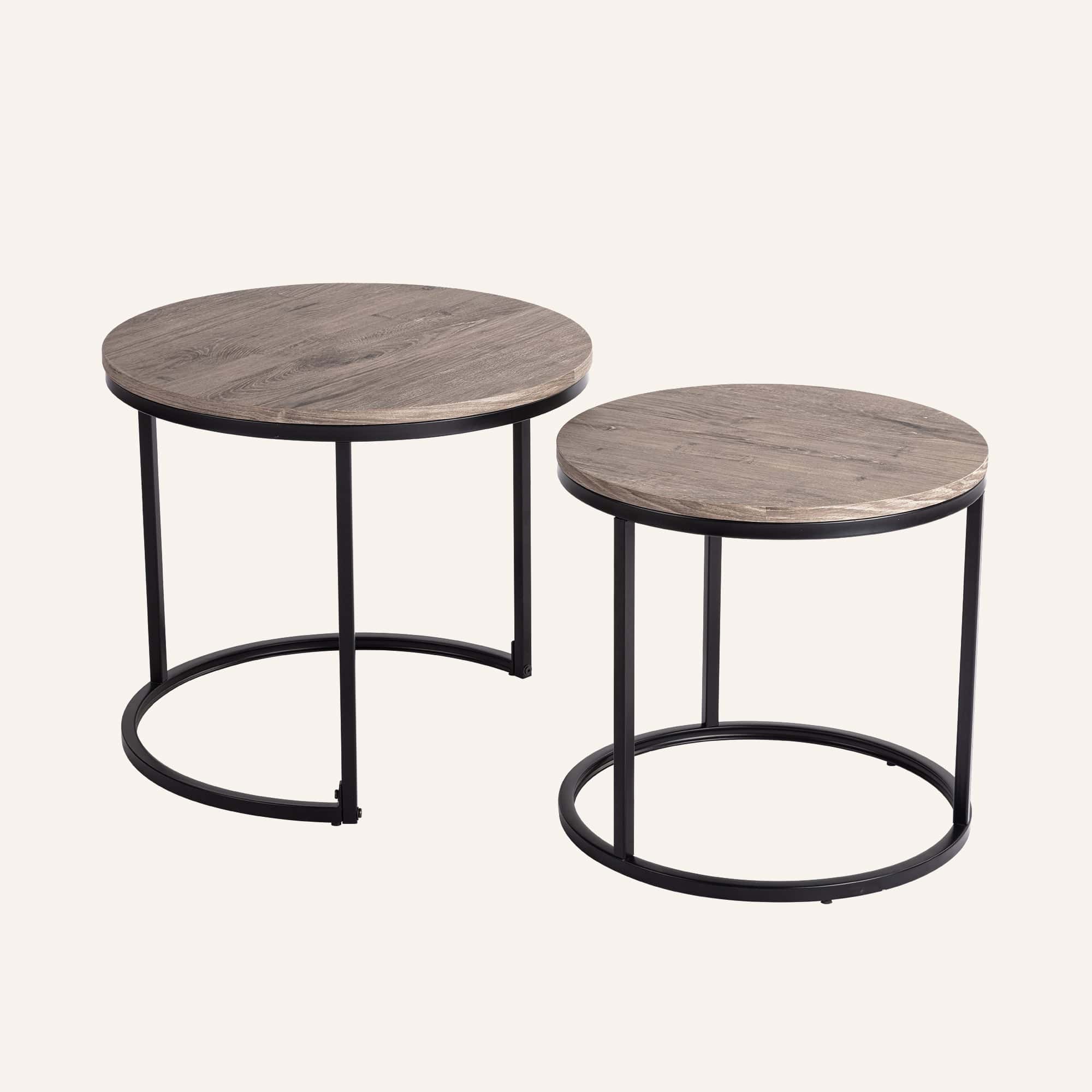 Stack&Style Nesting Coffee Tables with round wooden tops and black metal frames.