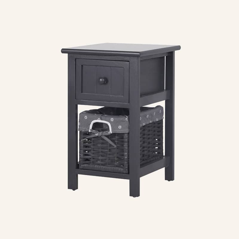 Grey bedside table with wicker basket and storage drawer for bedroom decor.