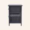 Grey bedside table with wicker basket and fabric drawer for bedroom storage.