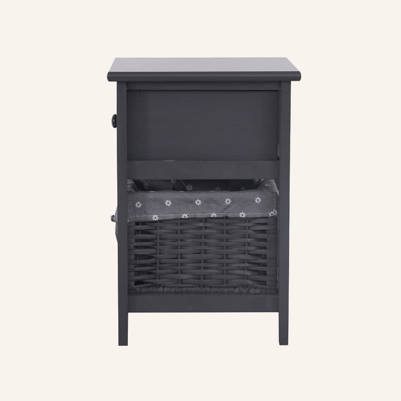 Grey bedside table with wicker basket and fabric drawer for bedroom storage.